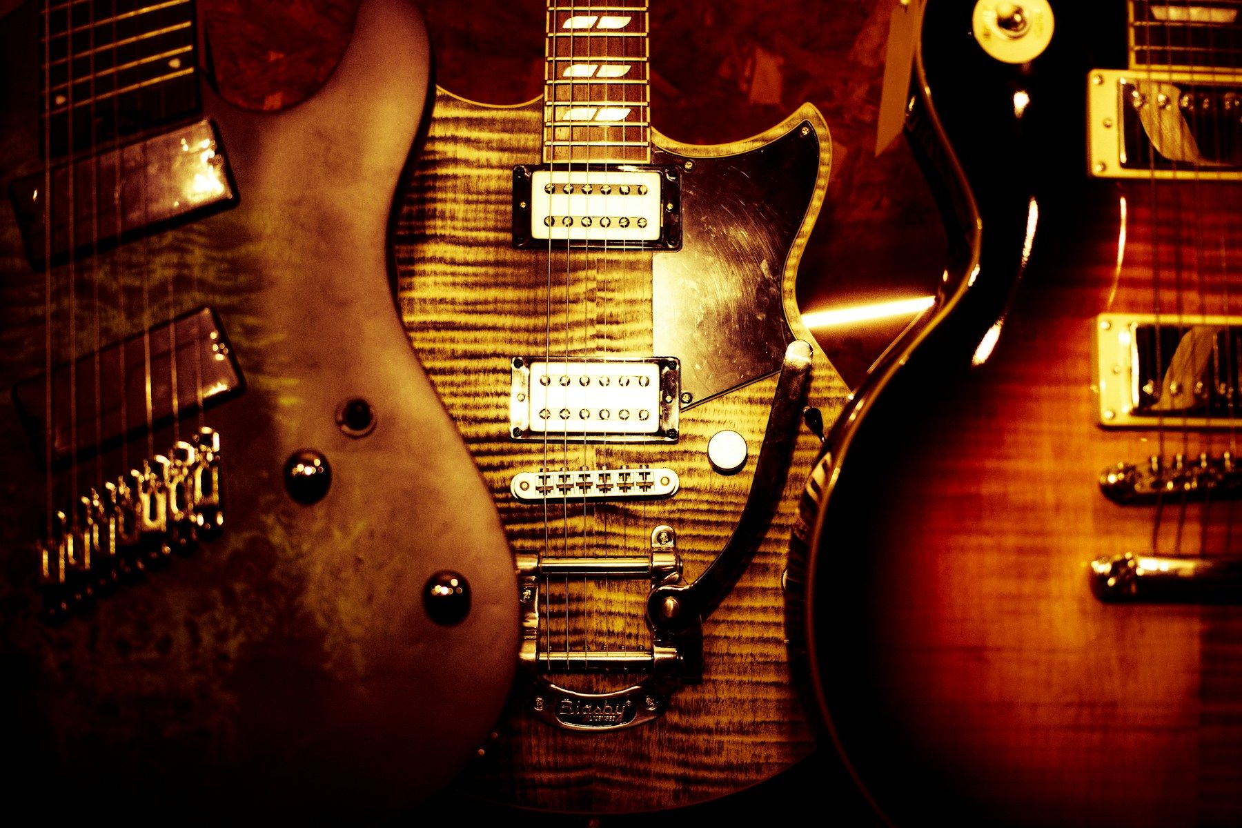 Burst stained-wood Huff built guitar